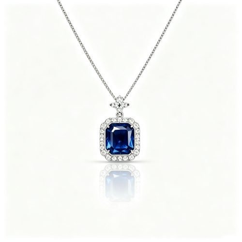 Solid 18K gold necklace with 2ct unheated Royal Blue sapphire, glass‑body, lab‑grown diamond halo, ideal for daily wear & gifting.