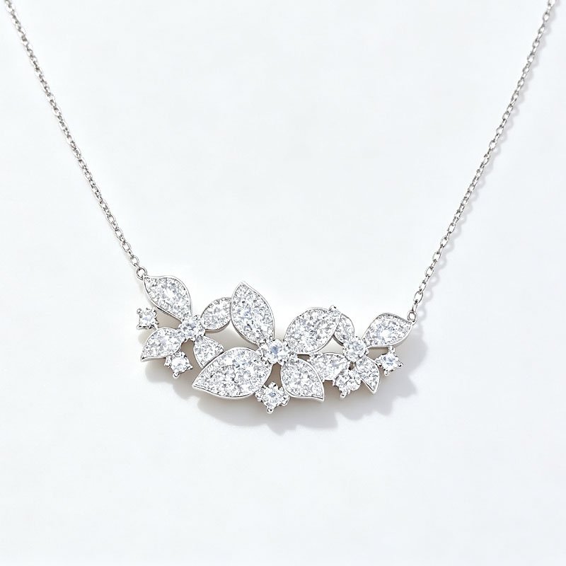 Luxury floral-leaf diamond 3-piece set, including necklace, ring and earrings.