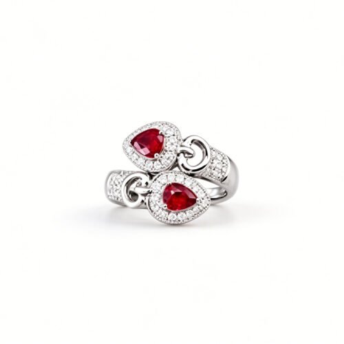 Luxury pear‑shape ruby bypass ring, 0.75ct ruby, 0.30ct TW diamonds. Ideal for dinner parties & Christmas gifts for women.